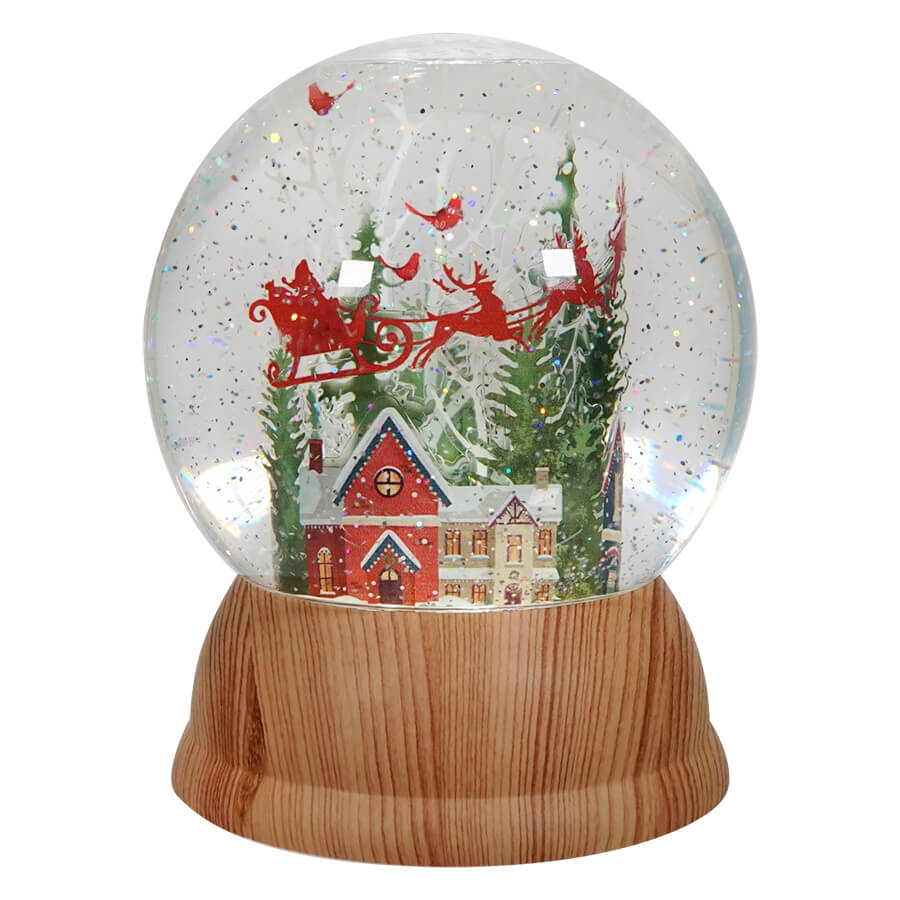 Santa Soaring Above Town Silhouette Lighted Waterglobe