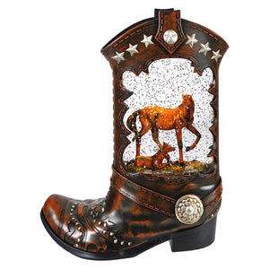 Lighted cowboy boot with led light featuring a spinning snow globe insert of a mare and foal inside