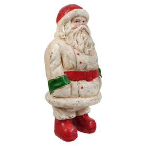 10.25 inch white vintage santa figurine with red and green coat, blue eyes, and bright red boots for folk art decor