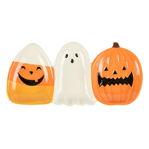 Set of three ceramic halloween tidbit trays with candy corn ghost and pumpkin designs perfect for party snacks