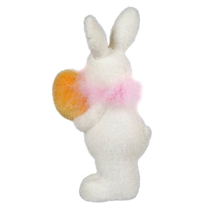 White plush bunny with pink and orange accents.