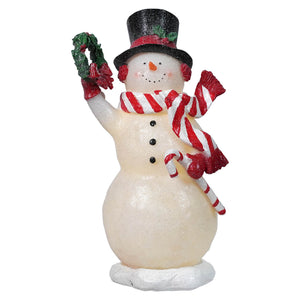 10 inch lighted merry snowman figurine with white body red glitter accents top hat scarf holding wreath decoration