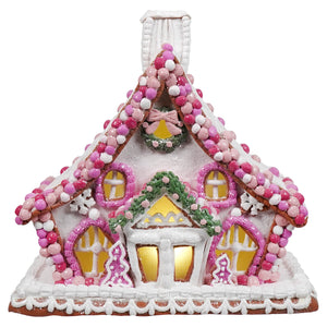11 inch lighted pink and white gingerbread house ornament from raz imports christmas collection with lit interior and sugar details