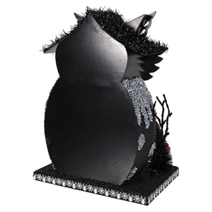 Black halloween-themed owl decoration with silver glitter and spiky hat for lighted haunted village setup