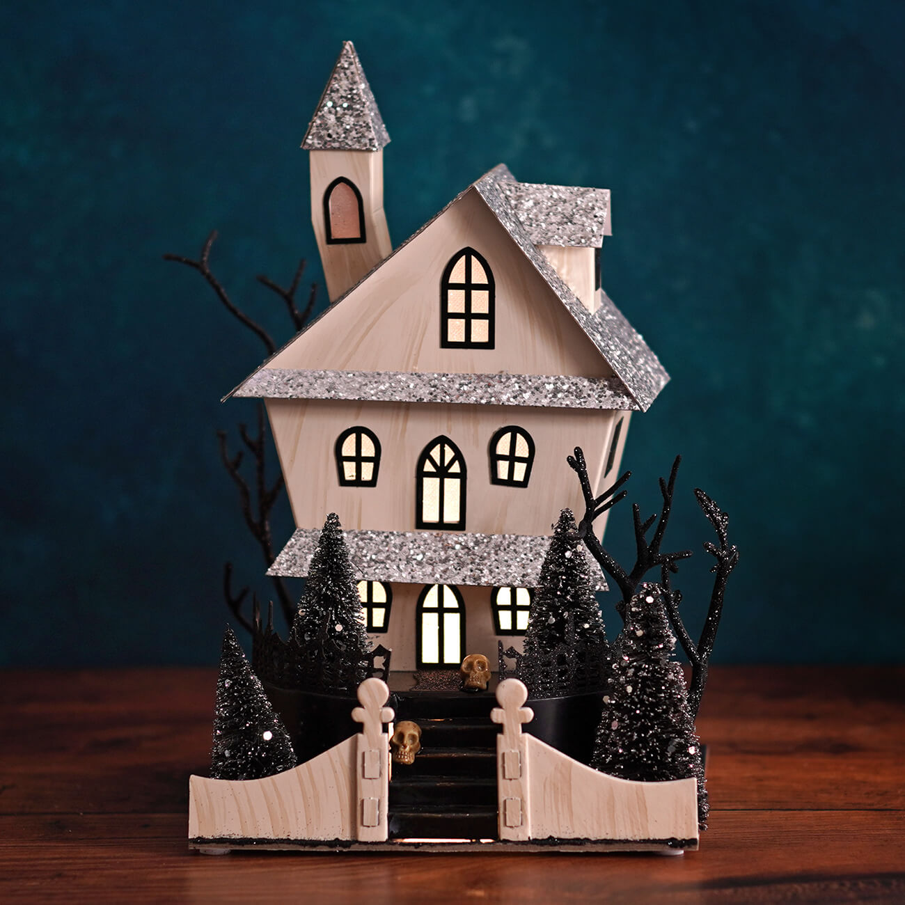 A 12.5 inch led lighted spooky halloween haunted house ornament with glittery silver roofs for halloween village houses and accessories