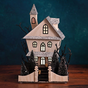 A 12.5 inch led lighted spooky halloween haunted house ornament with glittery silver roofs for halloween village houses and accessories