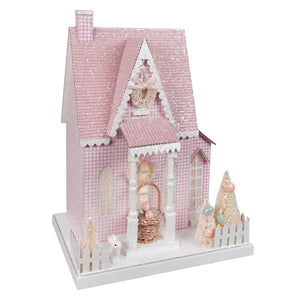 A delicate 12.75 inch lighted led pink spring house with glittery roof and trees perfect for easter and spring tabletop decor