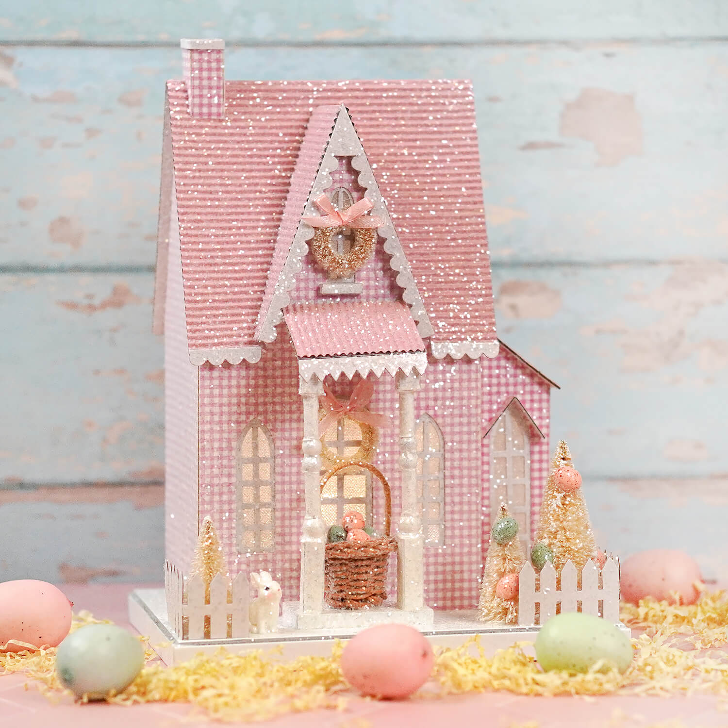Lighted 12.75 inch LED pink spring house with glittery roof white trim and timer perfect for easter and spring tabletop decor