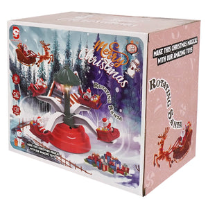 12 inch red plastic animated village santa table piece with rotating sleighs and light up musical christmas village scene