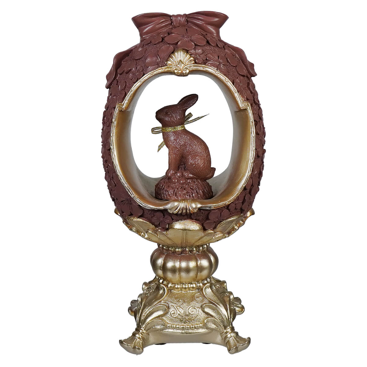 Brown resin 12 inch egg pedestal with gold trim and vintage easter bunny figural decor inside a window display