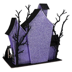 12 inch lighted purple haunted house with glittery finish black roof and bare tree silhouettes for halloween lights and decor