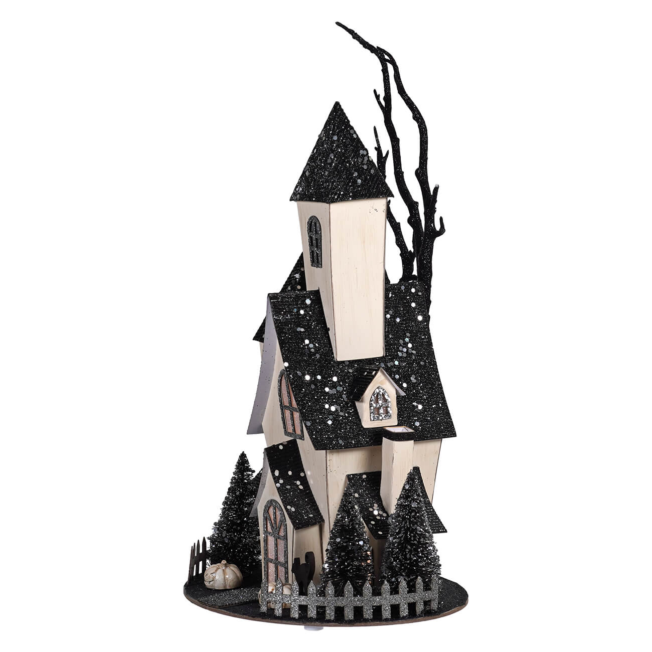 Black and white glittery halloween village house with tall steeple and tiny trees for spooky haunted house decor