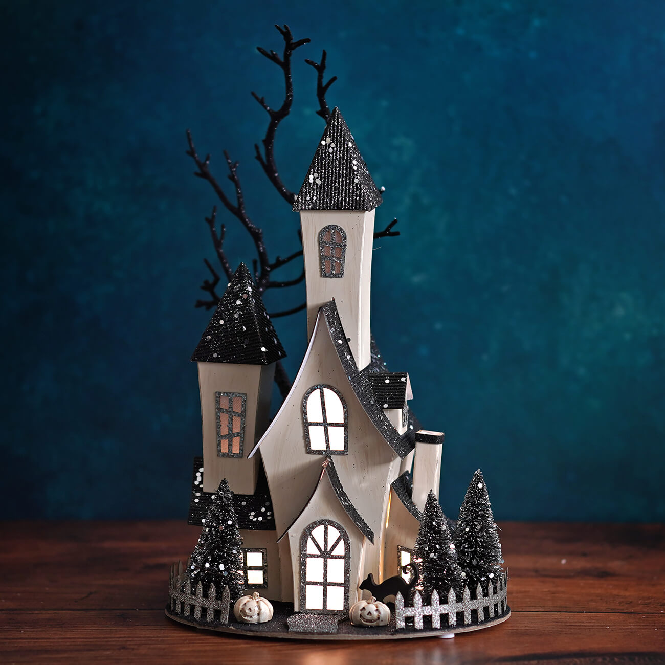 13.5 inch led lighted spooky halloween haunted house with white and black glitter, pumpkins, trees, and picket fence for halloween village houses and accessories
