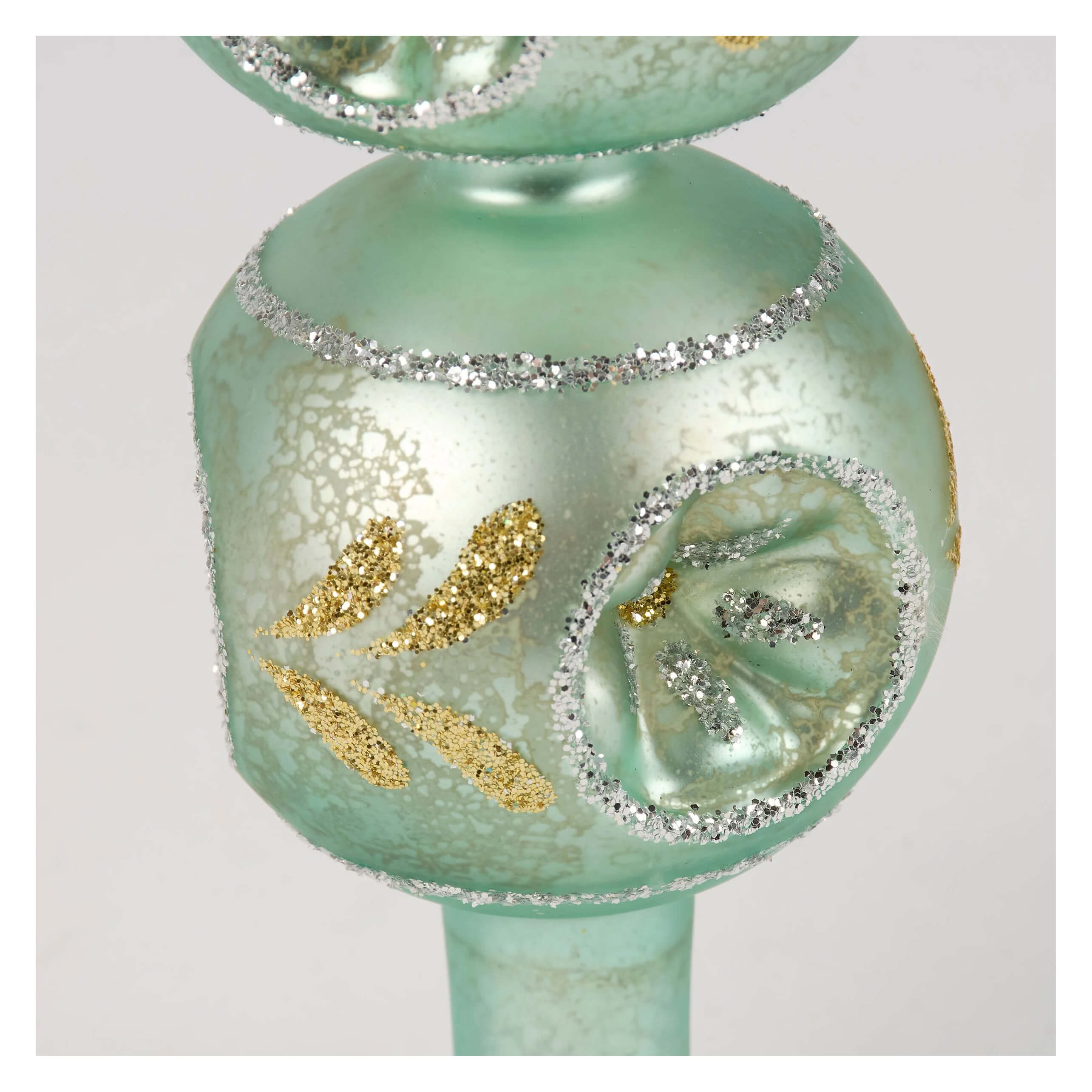 13 inch blue glass tree topper from kathy christmas collection with mint green glass silver glitter trim and gold leaf accents