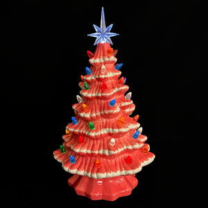 Large lighted pink ceramic christmas tree ornament with multicolored bulbs and blue star topper by degrees design