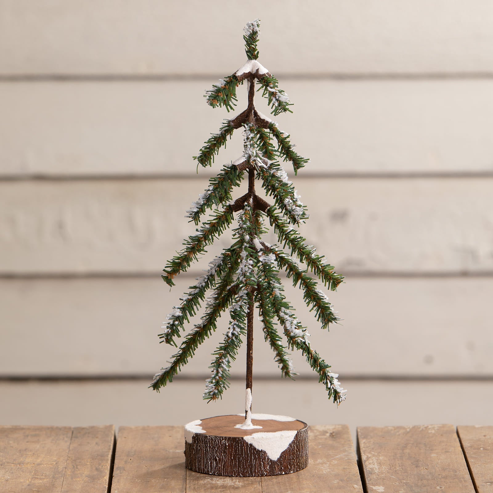 14 inch sparse miniature evergreen christmas tree with frosted branches and rustic wooden base perfect for vintage christmas village trees