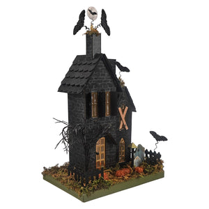 14 inch spooky lighted haunted house decoration in black with bat accents and moon on roof for haunting halloween house