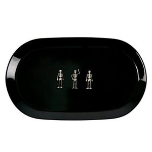 Black oval platter with glossy finish featuring three white skeletons for a skeletons oval platter design