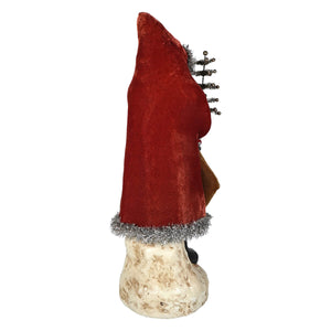 17 inch russet velvet belsnickle gnome figurine with red cap silver tinsel trim and miniature christmas tree on its back