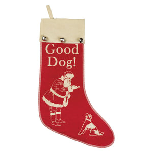 Red fabric merry christmas stocking with cream trim and santa giving good dog gesture to a dog good dog stocking