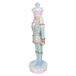 18 inch pastel green resin dessert toy soldier nutcracker in mint and pink candy uniform on cake-like base