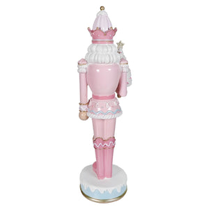18 inch pastel pink resin dessert toy soldier nutcracker with crown lace trim and icing details in pink and white