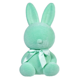 Mint green plush bunny with a matching satin bow around its neck.