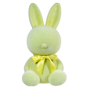 Mint green plush bunny with a yellow bow around its neck.