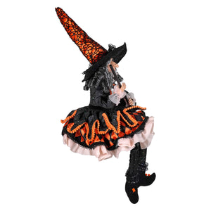 20 inch raz imports halloween witch figurine in a black party dress with orange trim and tall lace hat for halloween decor