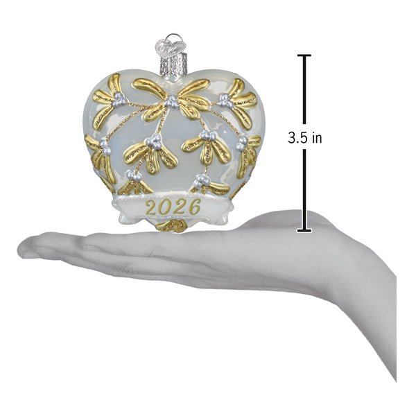 Translucent white glass heart ornament with gold mistletoe silver beads and 2026 banner perfect glittered heart ornament