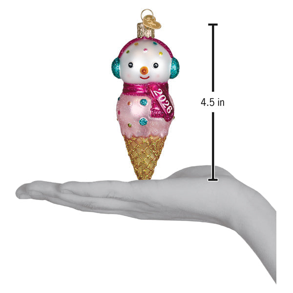 Pink and gold ice cream cone snowman ornament with teal earmuffs and glittery details from family owned world christmas