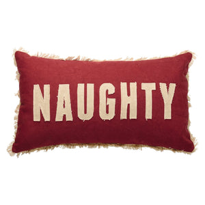 Red rectangular holiday pillow with cream naughty lettering and frayed edges by dan dipaolo perfect next to a believe pillow