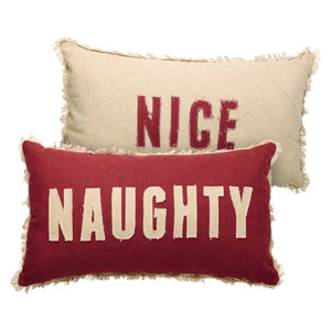 Red and cream holiday pillows with frayed edges and bold lettering from dan dipaolo naughty nice pillow collection