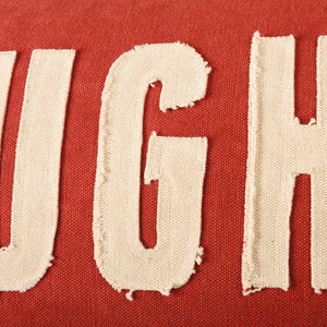 Red naughty nice pillow with cream frayed fabric letters ugh in bold distressed font by dan dipaolo holiday pillows
