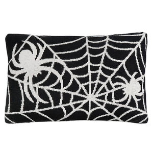 Black rectangular pillow with white knitted spider and web pattern perfect for happy halloween pillow and figural decor