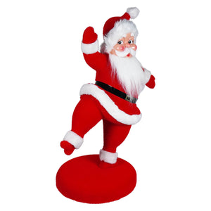 24 inch large flocked red dancing santa figurine with white trim and black belt on matching red base perfect for holidays
