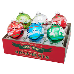 Box of Shiny Brite Christmas tree ornaments with colorful designs.