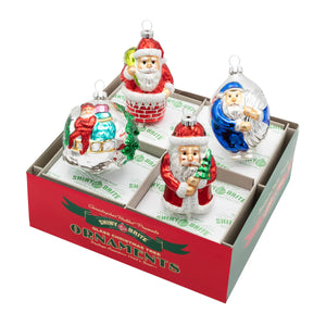 Set of four Christmas-themed Santa glass ornaments in a box with 'Shiny Brite' branding.