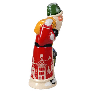 Hand-painted ceramic vaillancourt folk art santa claus with green hat red coat and yellow backpack 40th anniversary 2024