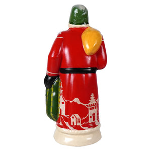 Red ceramic vaillancourt folk art santa figurine with green hat black belt and white snowscape design on the back