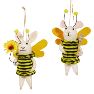 White felt bunny bee ornaments with yellow wings and striped bee suits holding sunflowers spreading holiday cheer