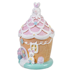 A charming 6.5 inch lighted resin easter bunny pink ice cream house with cute bunny and blue flower details