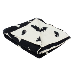 Black and white knitted bats throw blanket with bat silhouettes perfect for cozy home decor and spooky vibes