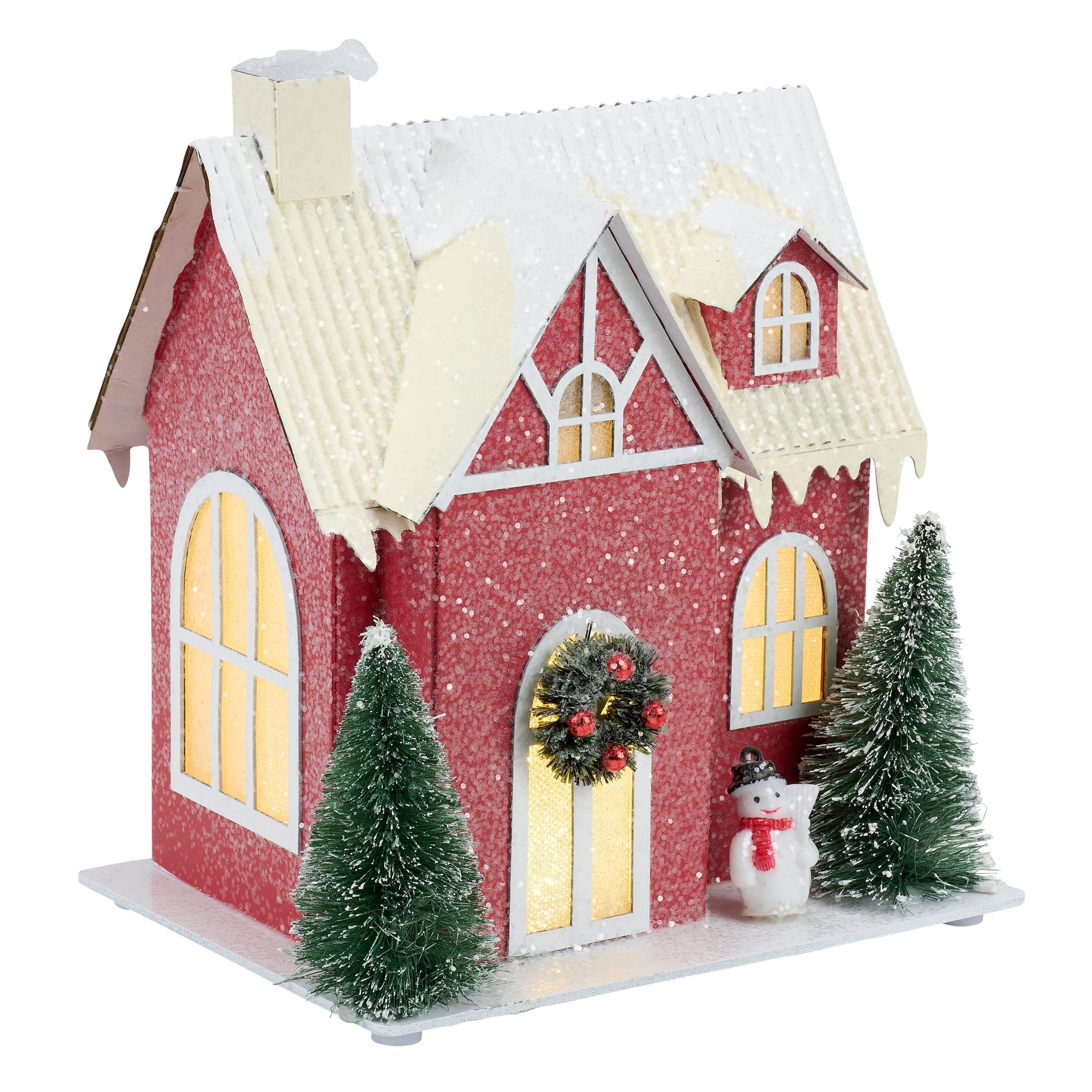 Lighted red house sitter with glittery red exterior white trim snow-dusted roof and warm glowing windows inside