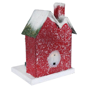 Lighted red house with red glitter finish and snow dusted roof featuring a white power outlet vintage reproduction christmas village houses