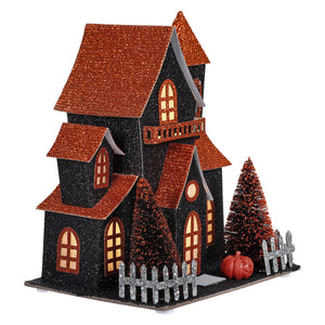 7.5 inch led lighted black and orange halloween haunted house with glittery roofs and silver fence by regency international