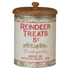 Vintage-style metal reindeer treats canister with wooden lid featuring festive holly and red text on off-white background