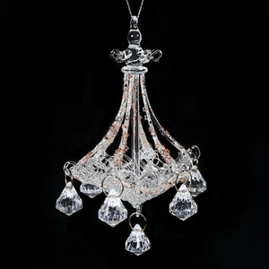 7 glass star adorned chandelier ornament with clear glass crystals and ornate slightly tarnished metal arms for decor