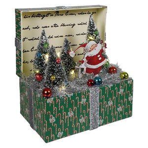7 inch lighted magic of christmas santa vignette box with green candy cane pattern silver trim and christmas ornaments