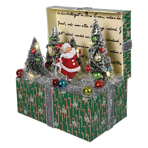 Green candy cane patterned 7 inch lighted christmas vignette box with santa figures and frosted trees ornaments